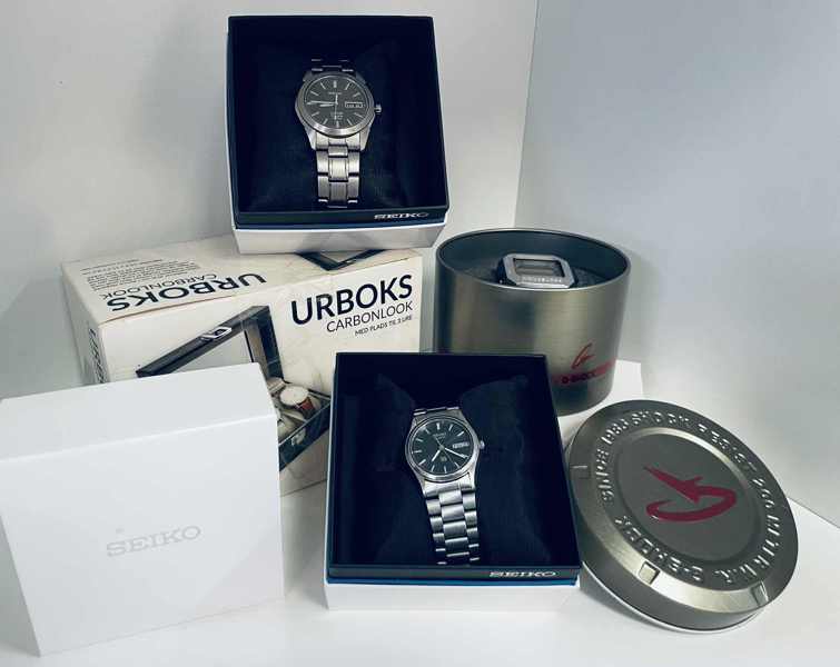 Samling af Casio/Seiko ure (4 enheder): G-Schock (3163), Sapphire Titanium 100 (7N43-0AS0), Seiko Day-Date Quartz SQ ( 8123-6220) samt urboks til 3 ure (carbon)
