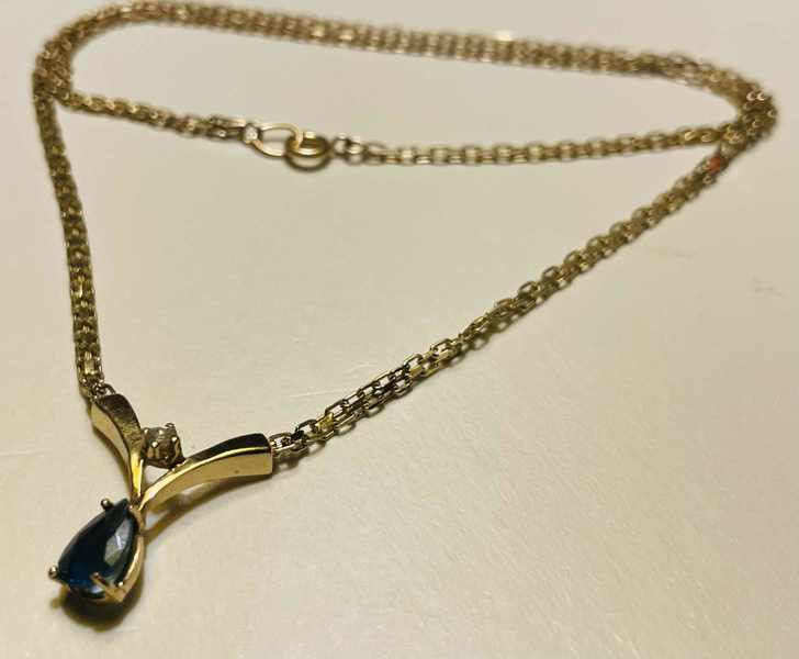 Guld: halskæde m. vedhæng udført i 14kt./585 prydet m. diamant og aquamarine (Å)
