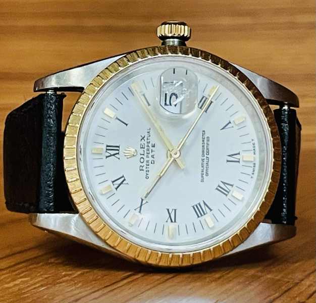 Rolex Oyster Perpetual Date Vintage prydet m. romertal