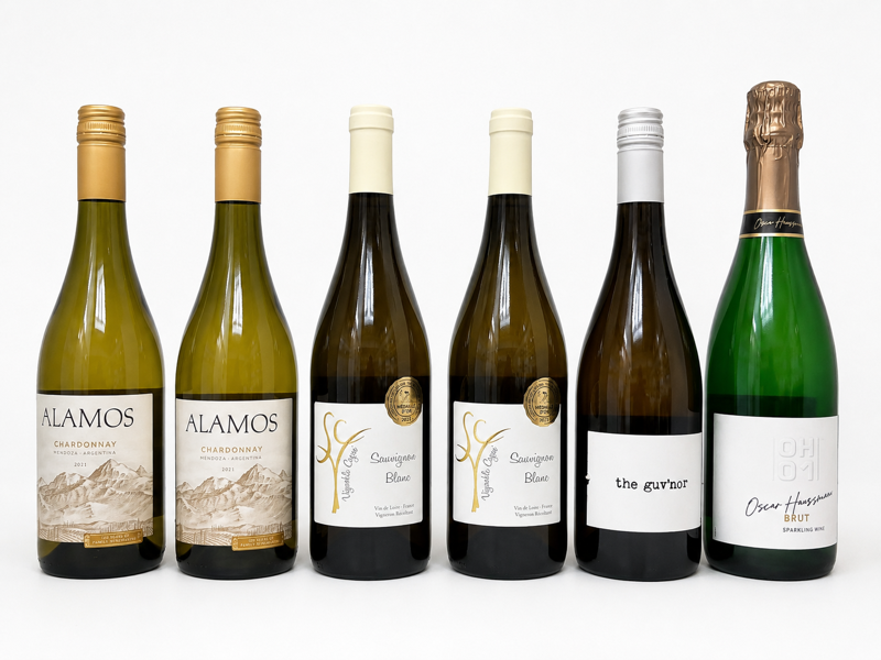 6 fl. hvidvine: 2 fl.  Domaine Vignoble Cogné Sauvignon Blanc IGP Loire (2024), 1 fl. Oscar Haussmann OH01 Sparkling Brut, 2 fl. Alamos Chardonnay Mendoza Catena (2021) samt 1 fl. The Guv'nor Blanco